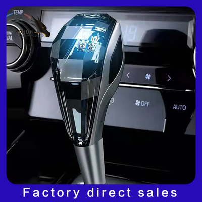 Los accesorios interiores autos Crystal Touch Luminous Pommeau De Levier De Vitesse De Voiture RGB llevaron el botón del engranaje del coche del cambio