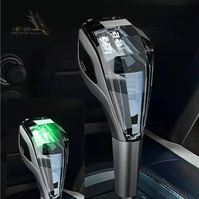 Los accesorios interiores autos Crystal Touch Luminous Pommeau De Levier De Vitesse De Voiture RGB llevaron el botón del engranaje del coche del cambio