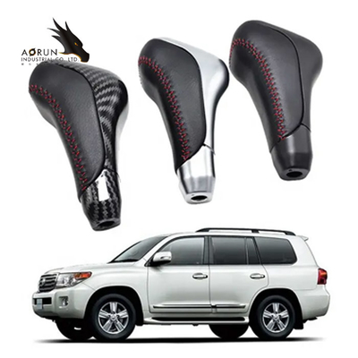 Botón automático de cuero auténtico negro del cambio de marcha del coche de la palanca para la TUNDRA TRD FAVORABLES FJ de LAND CRUISER 2003-2017 LC5 4RUNNER